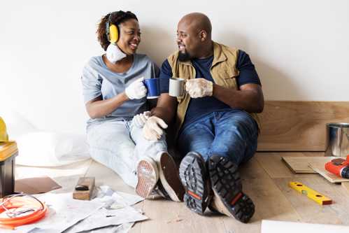 Couple taking a break from renovating